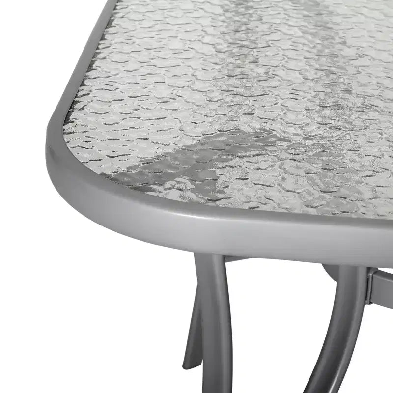 Table de terrasse rectangulaire avec plateau en verre trempé, trou pour parasol et structure en tubes d'acier noir
